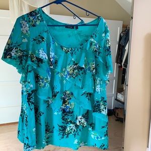 Women’s turquoise flounce blouse
